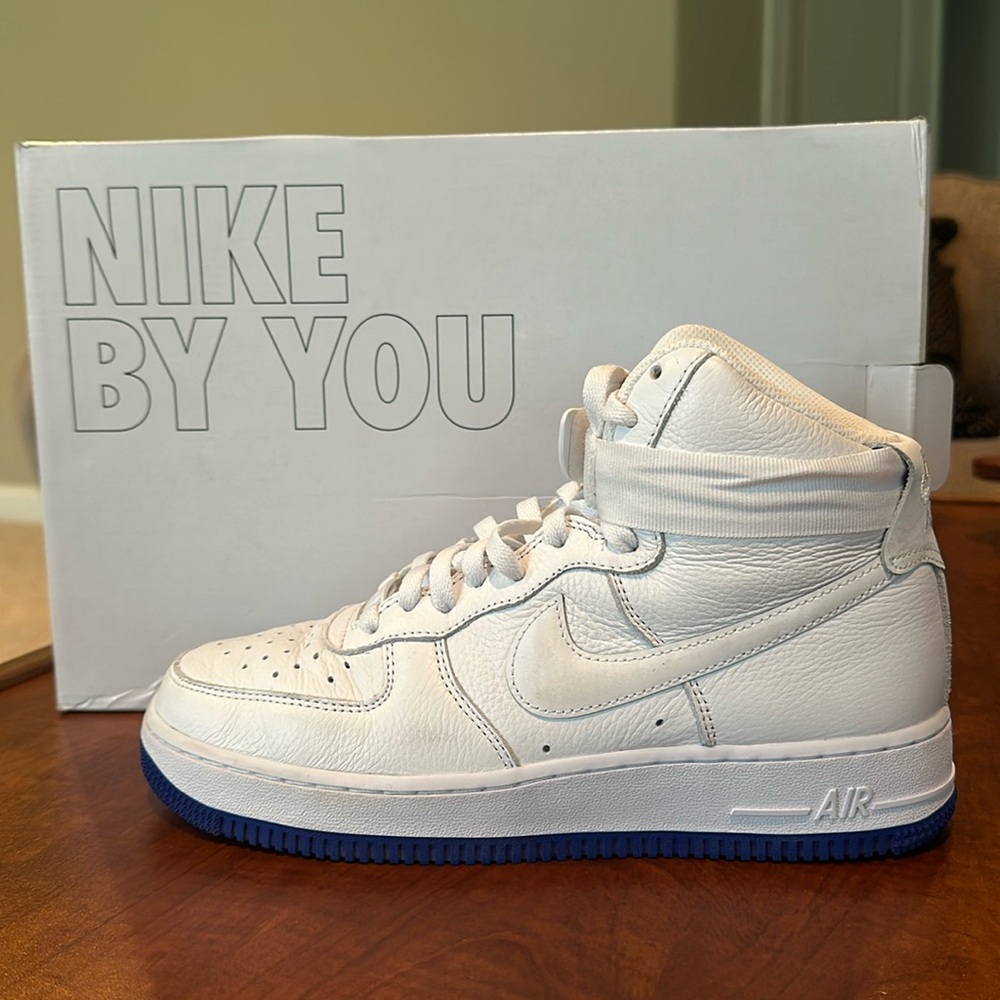 Women’s Nike Air Force 1 high top with royal blue soles